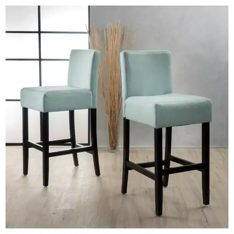Set di 2 sgabelli da bar imbottiti azzurro chiaro con gambe in legno nero